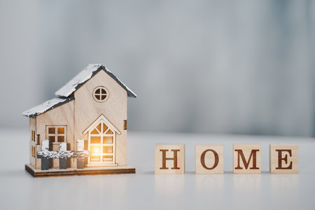 Close up of model house and HOME letter. Real estate , Home loan and Investments concept.の写真素材
