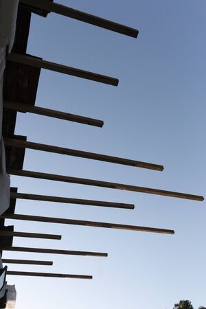 A close up view of new wooden battens that was been installed into a roof