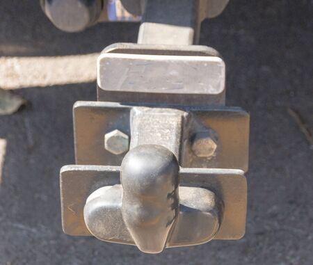 A close up view of a car tow hitch with a rubber cover on the endの写真素材