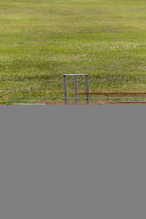 A close uop view of a fallen white metal wicketの写真素材