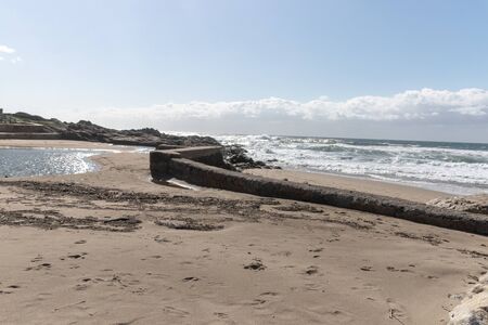 A view of the blue waters and sky at a beautiful beach on a summers dayの写真素材
