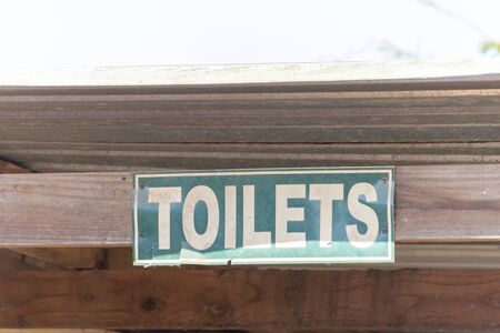 A close up view of a toilets signの写真素材