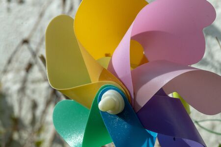 a close up view of a very colourful garden windmillの写真素材