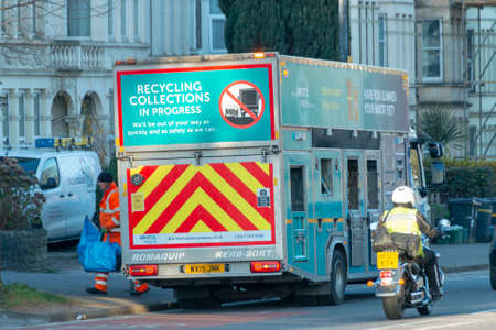 Bristol-March 2020-England-a close up view of a recycling collections truck picking up its weekly loadsのeditorial素材