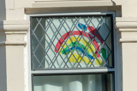 Bristol-March 2020-England-a close up view of rainbows that children and drawn and put up into thier windows to show hope for this time of lockdown during the C19 virus outbreakのeditorial素材