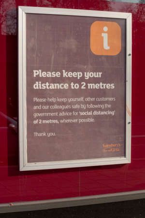 Bristol-March 2020-England-a close up view of a sign outside a supermarket during the cronavirus, covid-19 virus epidemic in englandのeditorial素材