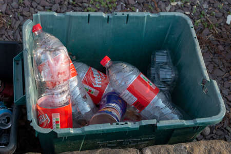 Bristol-March 2020-England-a close up view of plastic soft drink bottles in a waste recycling boxのeditorial素材