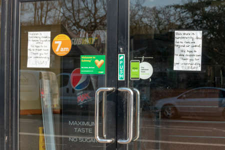 Bristol-March 2020-England-a close up view of a sign outside a supermarket during the cronavirus, covid-19 virus epidemic in englandのeditorial素材