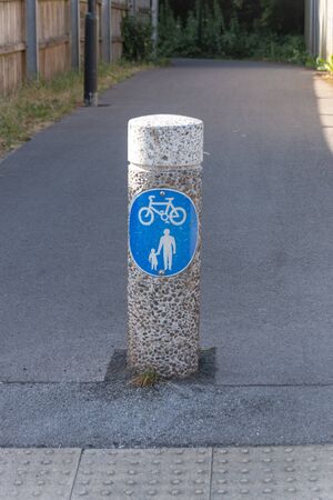 a close up view of a sign to show there are pedestrian and cyclists in the areaの写真素材