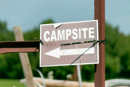 A close up view of a camping site direction sign,の写真素材