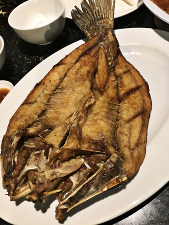 Deep Fried Sea Bass with fish sauce.の写真素材