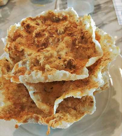 Crispy rice crepe with dried shredded pork.