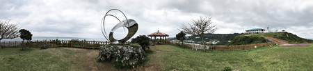 Okinawa, Japan - March 21, 2018:  The chrome sculpture at Cape Chinen Park in Nanjo city of Okinawa,...