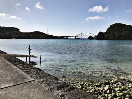Leisurely Fishing  at Ikei Island in Okinawa, Japan.の写真素材