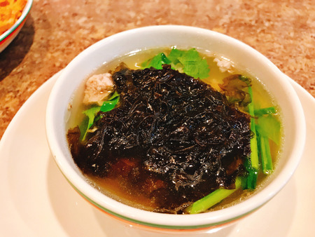 Mild soup with seaweed and minced pork in Thailand.の写真素材
