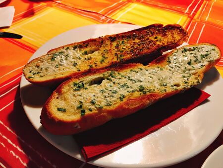 Baguette or french bread baked with garlic butter.