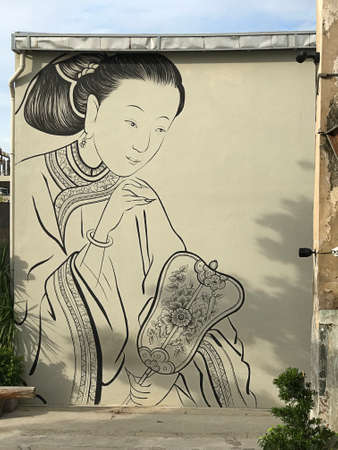 Bangkok, Thailand - July 27, 2019: Beautiful paintings on the wall of the building of LHONG 1919 in Bangkok, Thailand. Lhong 1919 located on the bank of the Chao Phraya river, the mid-nineteenth century Sino-Siamese port now welcomes all to savour it's riのeditorial素材