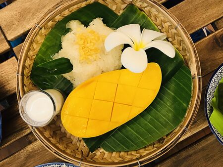 Thai famous dessertâ€¦Set of mango sticky rice with coconut milk.