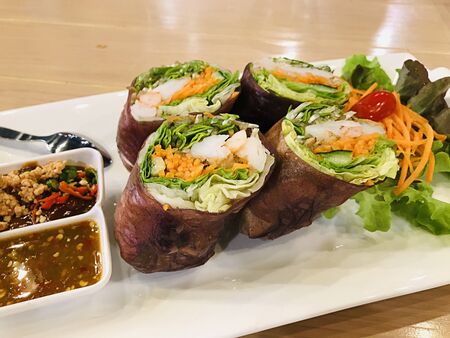 Dish of yummy Shrimp morning salad rolls.