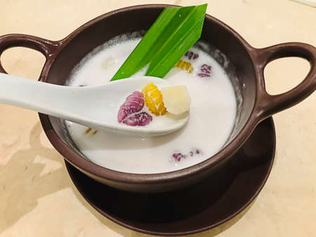 Thai traditional dessert...Krong krang or Sweet rice gnocchi in coconut milk.の写真素材