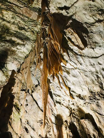 Stalactite and stalagmite of Postojna Cave in Slovenia.