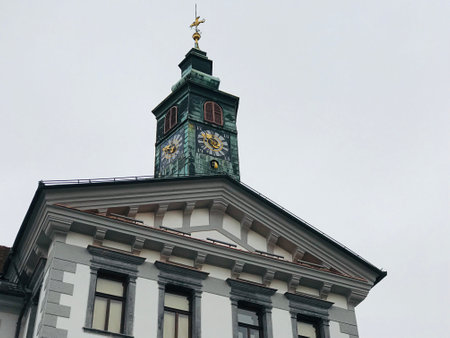 Ljubljana, Slovenia - November 8, 2018:  Clock tower of The Ljubljana Town Hall. It is located in...