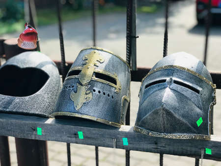 Trakai, Lithuania - September 14, 2019:  A variety of warrior hats made of metal are on sale on the lakefront around the Trakai Island Castle in Trakai, Lithuania.のeditorial素材