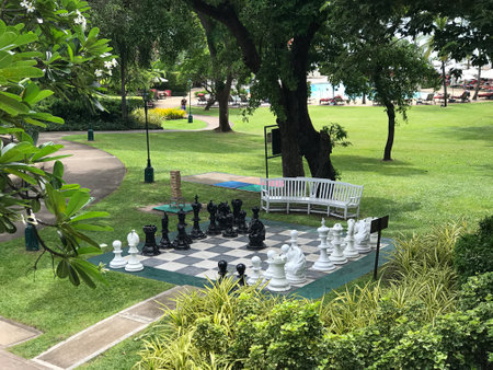 Prachuab Khiri Khan, Thailand - July 23, 2022:  Outdoor giant chess in the garden of Centara Grand Beach Resort & Villas Hua Hin in Prachuab Khiri Khan, Thailand.のeditorial素材