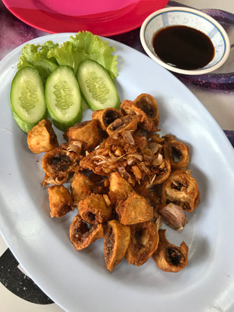 Crispy deep fried stewed pork chitterlings in Thailand.の写真素材