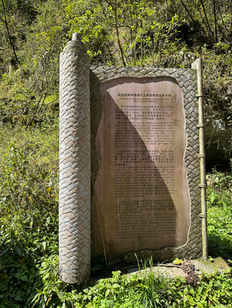 Chongqing, China - March 29 2024:  Description label about "General Introduction to Biodiversity in Wulong Karst Tourism Region" is on display in the Three Natural Bridges in Chinaのeditorial素材