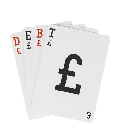 Word DEBT on Playing Cards with Pound Sterling Symbolの写真素材