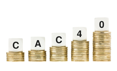 CAC 40  Paris Stock Exchange Share Index  on Gold Coin Stacks Isolated on Whiteの写真素材