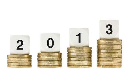 Year 2013 on Stacks of Gold Coins with White Backgroundの写真素材