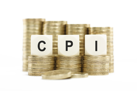 CPI  Consumer Price Index  on Coin Stacks Isolated White Backgroundの写真素材