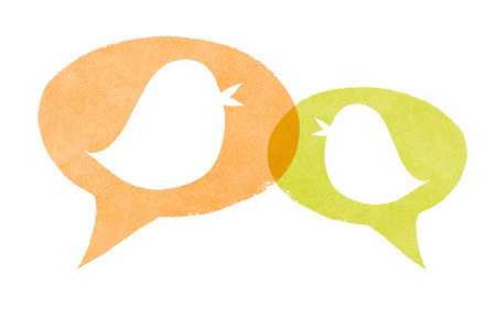 Birds with Orange and Green Speech Bubblesの写真素材