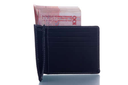 stack of yuan notes in wallet