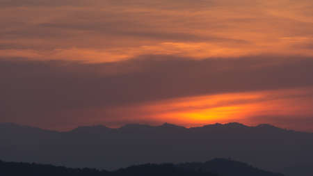 golden sky after sunset in the countrysideの写真素材