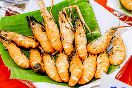 Big orange river shrimp be mouthwatering put on banana leaf ready to serve for customers in the...