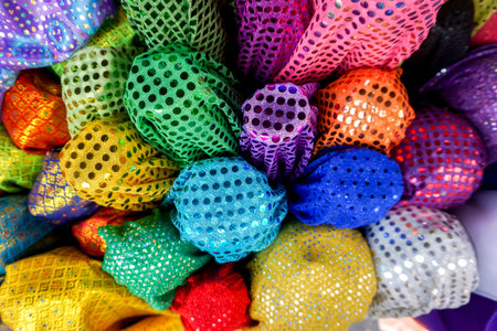 Top view and colorful of Saree fabrics fit to screen background and textured. Saree fabrics is Traditional indian women dress Used as both the garment and the blanket.の写真素材