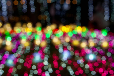 Blurred and bokeh of Christmas holiday lightings pattern background