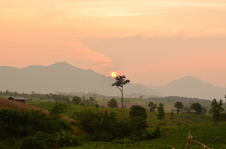 Sunset and the mountainsの写真素材