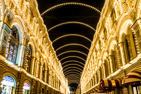 Autumn 2014. Evening. Russia. Moscow. GUM with backlight. View from the side Ilyinka Street.?GUM is the main universally store in many cities of the former soviet union.のeditorial素材