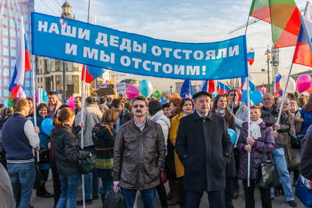 Spring 2015. Day-evening. Russia. Moscow. The Red Squere. Vasilevsky Descent. The meeting and concert in honor of the anniversary of the reunification of the Crimea and Russia.のeditorial素材