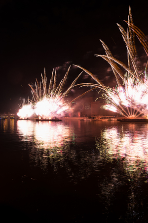 Russia. Moscow - September 26, 2015. The opening of the festival Circle Of Light 2015. Gorkiy Park. View of the complex of buildings of the Ministry of Defense during the show. Salute. Fireworks.のeditorial素材