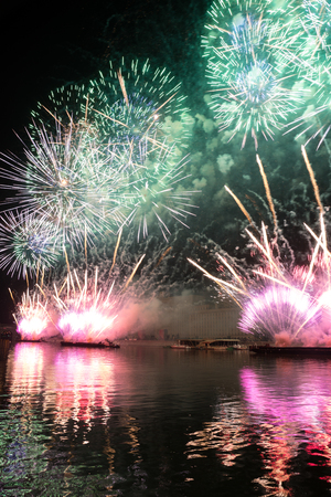 Russia. Moscow - September 26, 2015. The opening of the festival Circle Of Light 2015. Gorkiy Park. View of the complex of buildings of the Ministry of Defense during the show. Salute. Fireworks.のeditorial素材