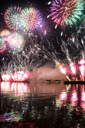 Russia. Moscow - September 26, 2015. The opening of the festival Circle Of Light 2015. Gorkiy Park. View of the complex of buildings of the Ministry of Defense during the show. Salute. Fireworks.のeditorial素材