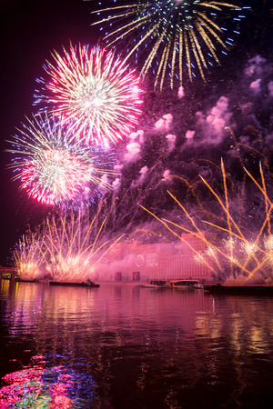 Russia. Moscow - September 26, 2015. The opening of the festival Circle Of Light 2015. Gorkiy Park. View of the complex of buildings of the Ministry of Defense during the show. Salute. Fireworks.のeditorial素材