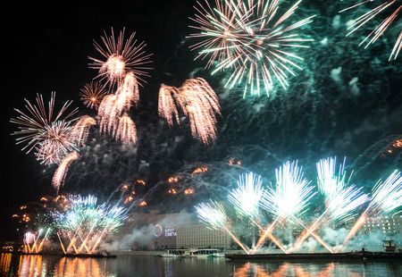 Russia. Moscow - September 26, 2015. The opening of the festival Circle Of Light 2015. Gorkiy Park. View of the complex of buildings of the Ministry of Defense during the show. Salute. Fireworks.のeditorial素材