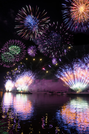 Russia. Moscow - September 26, 2015. The opening of the festival Circle Of Light 2015. Gorkiy Park. View of the complex of buildings of the Ministry of Defense during the show. Salute. Fireworks.のeditorial素材