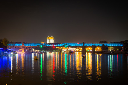 Russia. Moscow - September 26, 2015. The opening of the Festival Circle Of Light. Gorkiy Park. The Andreevskiy Bridge during the Show.のeditorial素材